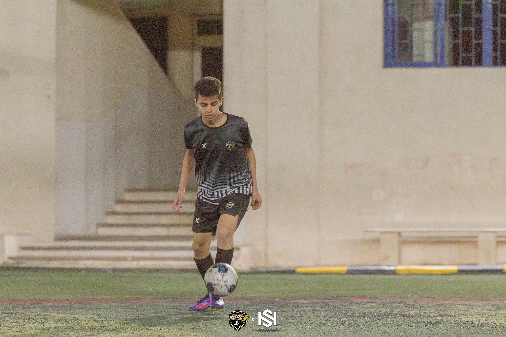 Mission image showing a coach instructing young players