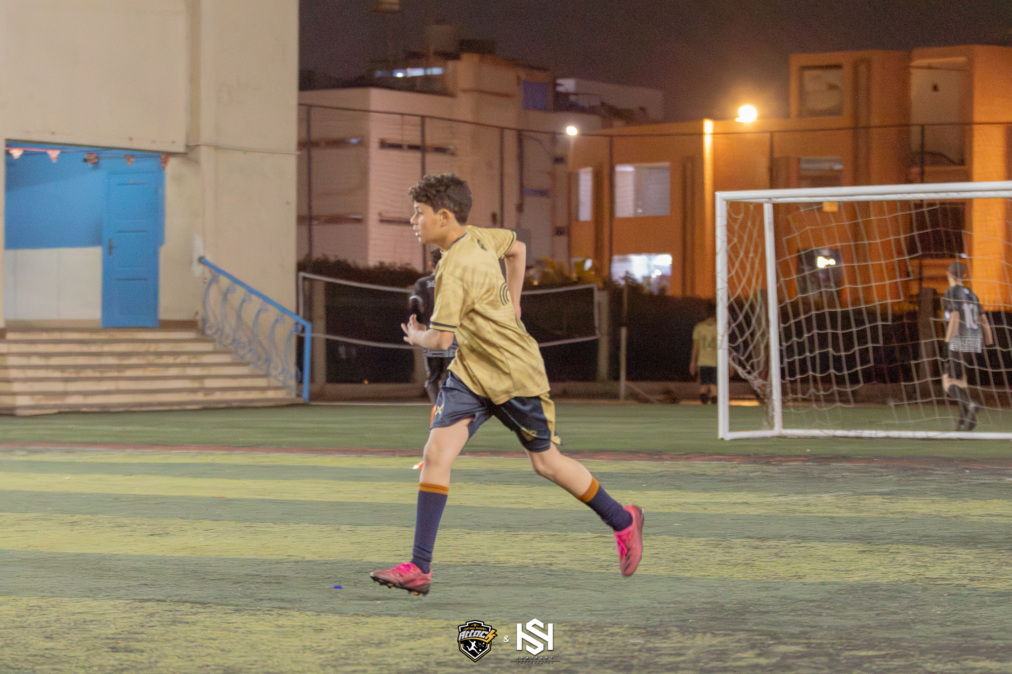 Vision image showing a group of young football players in action